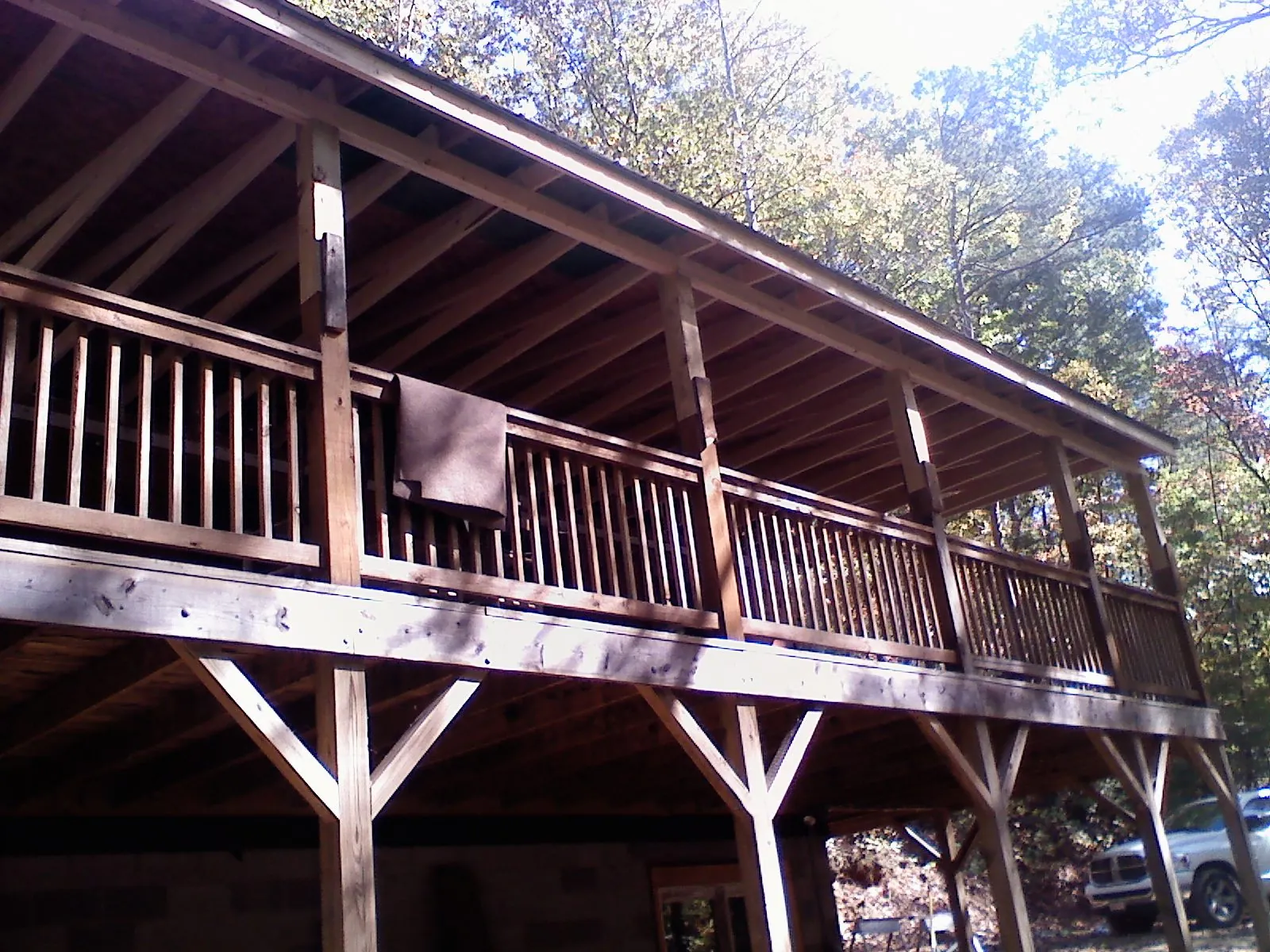 Timber framing under a new elevated porch and deck — Roof Leak Repair in Crane by Roofing Brothers
